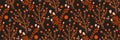 Rich orange small meadow flowers on a dark black background. Elegant floral seamless pattern in vector.